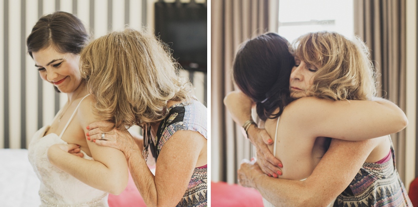 emotional moment between a bride and her mother before her wedding at the citizen hotel by heather elizabeth photography