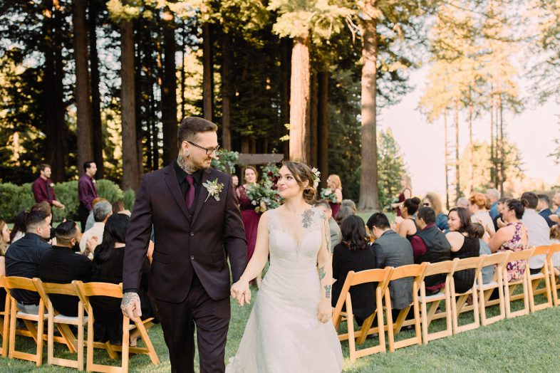 tattooed couple at their bohemian wedding at the mountain terrace by heather elizabeth photography